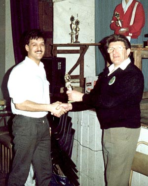 Malcolm Parker and Roy Charlesworth shaking hands