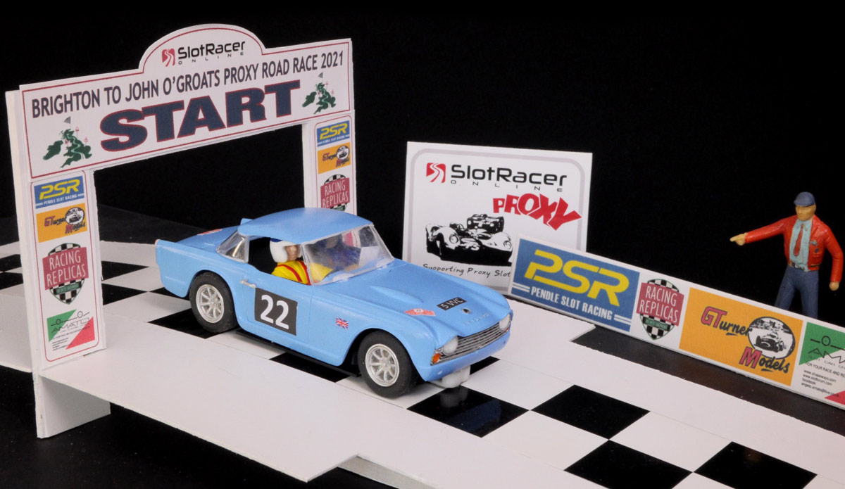 A Triumph TR4 leaves the start ramp