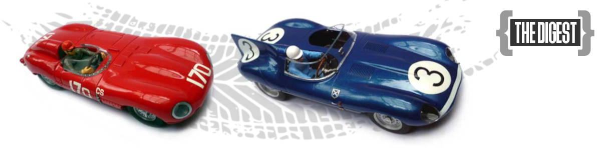 The Digest with two Jaguar slot cars