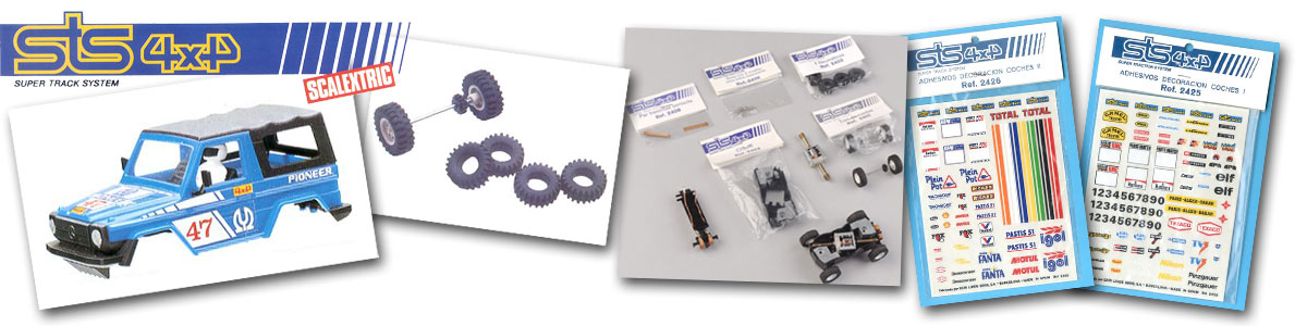 Various spare parts from the STS range, including a body, wheels and tyres, motor, and decals