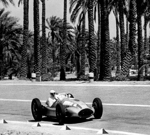 A Mercedes car passes the pits in 1939