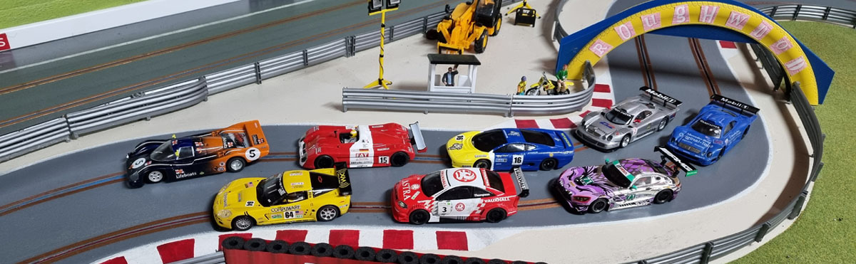 Roughwood slot track with a grid full of cars