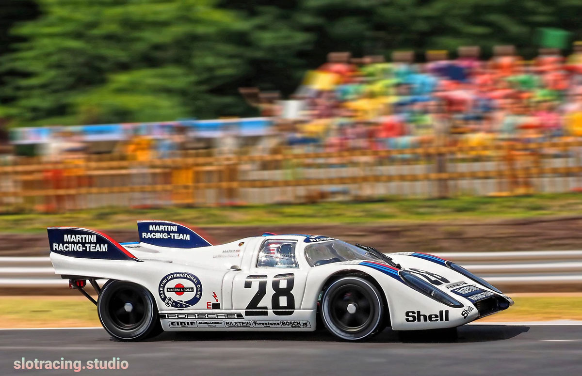 Fly Porsche 917K in front of a packed grandstand